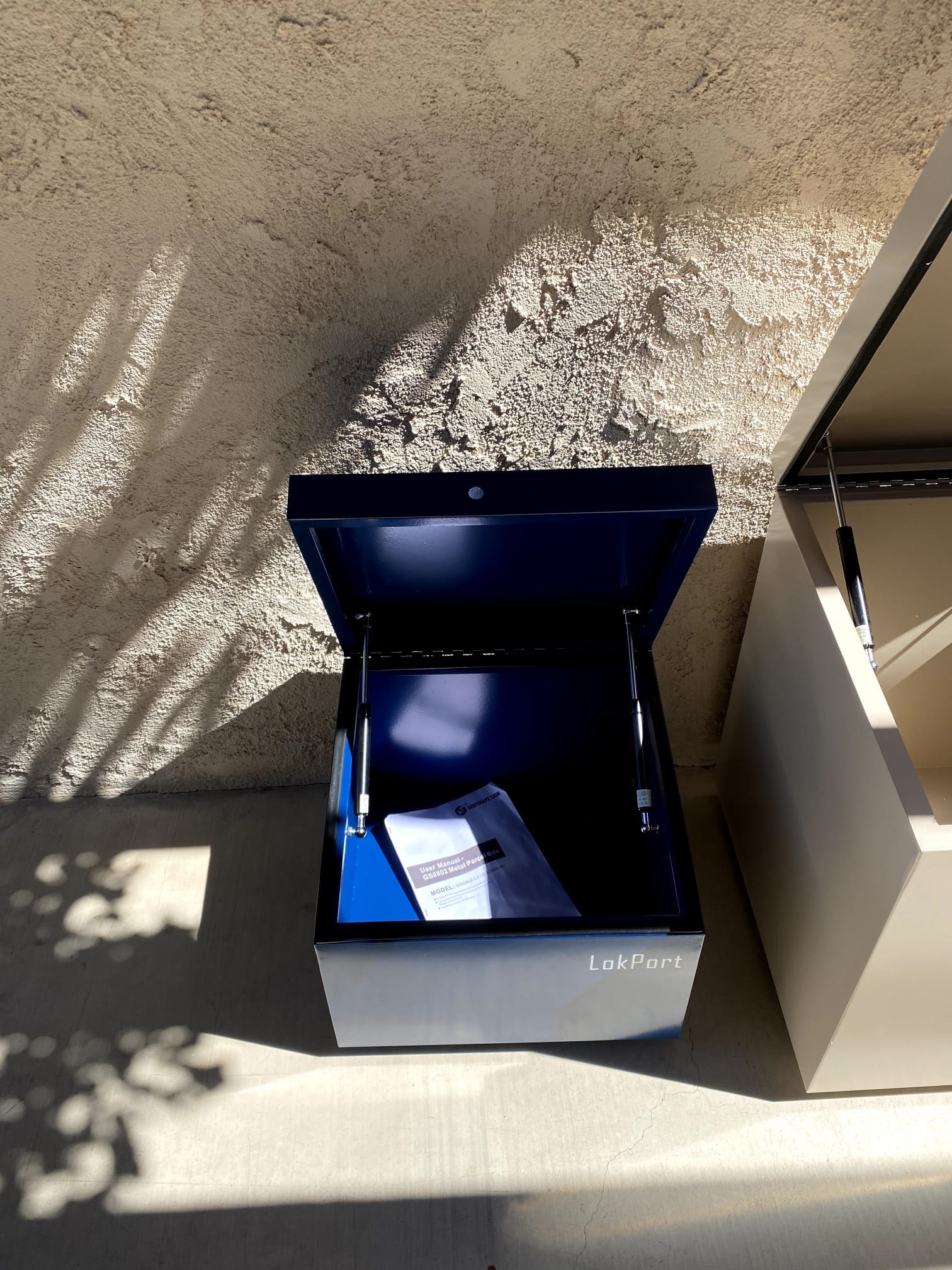 LokPort pilot unit — open showing interior storage compartment